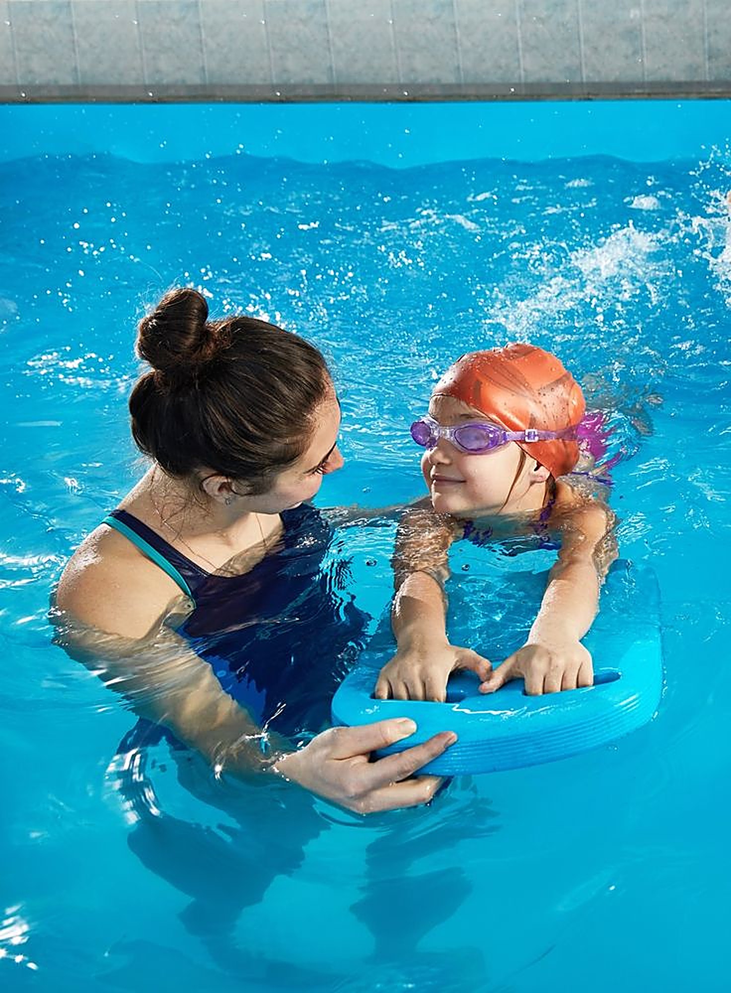 Instructor coaching in the water
