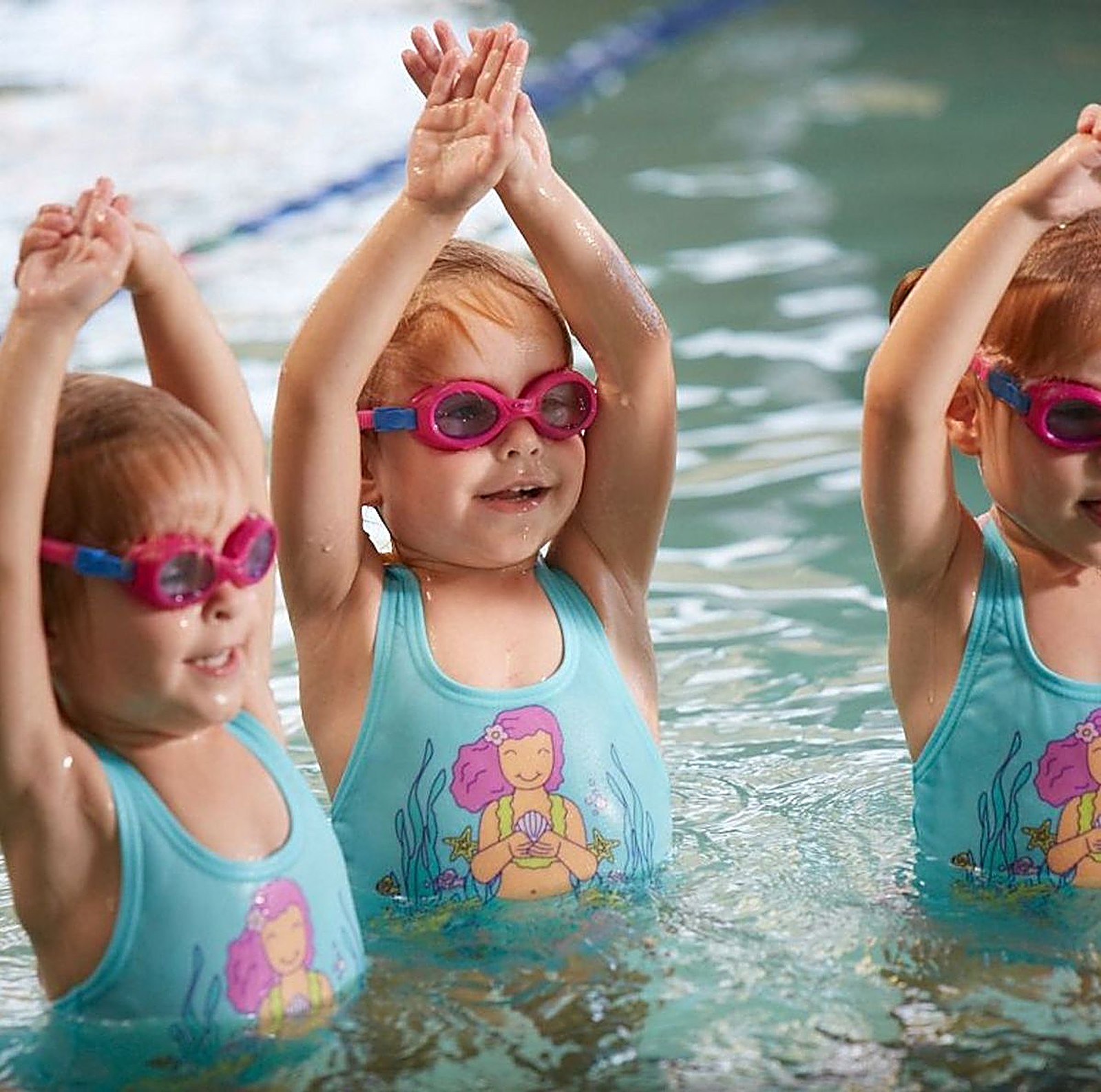 Happy young swimmers