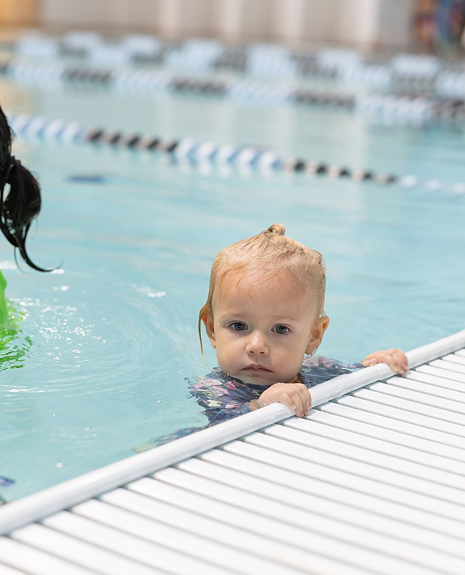 Toddler at the pool edge