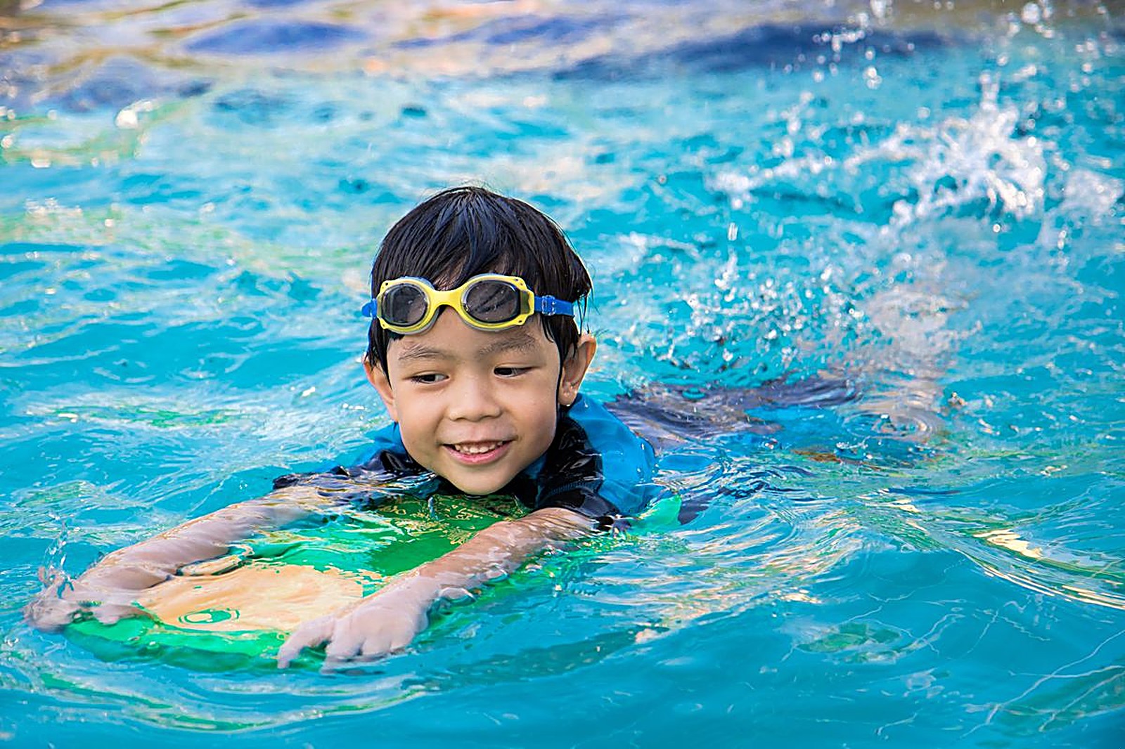 Boy swimming confidently