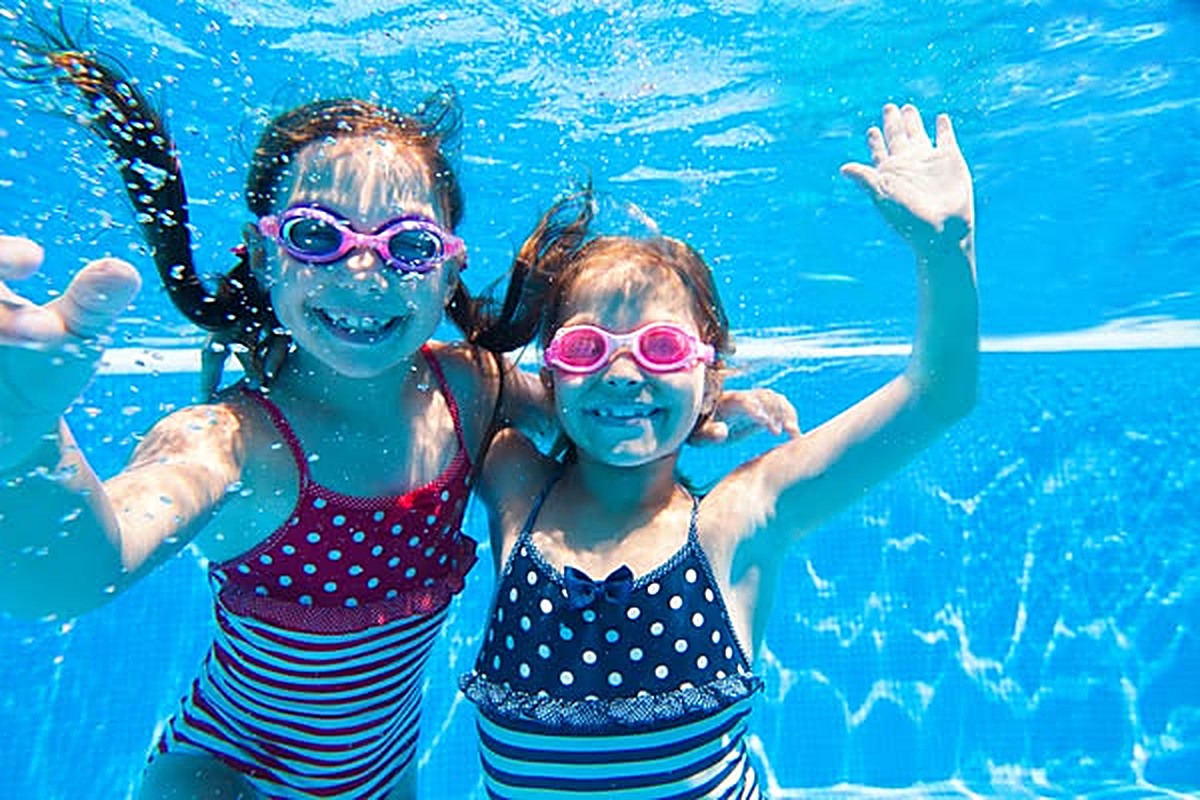Two young swimmers underwater